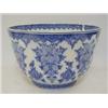 Image 1 : A TIN GLAZED EARTHENWARE PUNCH BOWL, 19th Century, underglaze blue decoration after Berain, marke...