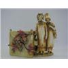 Image 1 : A JARDINIERE, late 19th Century, two girls standing beside a square container with applied fruit,...