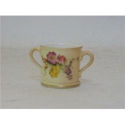 A ROYAL WORCESTER MINIATURE BLUSH IVORY TWIN HANDLED CUP, 1904, floral decoration, height 4cm  30...