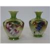 Image 1 : A PAIR OF ROYAL WORCESTER BOTTLE VASES, 1905, florally painted panels within a raised gilt lined ...