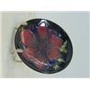 Image 1 : A MOORCROFT TRINKET DISH, tube-lined flower head, diameter 12cm  30-40...