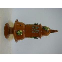 A GLAZED TERRACOTA SMOKERS COMPANION, comprising tobacco jar, cover and seal, spitoon and stand, ...