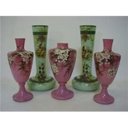 A GARNITURE OF PINK OPAQUE GLASS VASES, late 19th Century, and a pair in pastel green (5)  20-40...