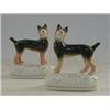 Image 1 : A PAIR OF STAFFORDSHIRE HOUNDS, mid 19th Century, standing on oval plinths, height 9cm, (2)  80-1...