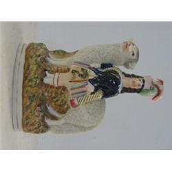 A STAFFORDSHIRE FLATBACK FIGURE, 19th Century, highlander standing in front of a ram, with variou...