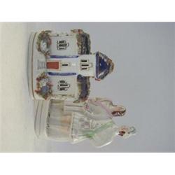 A STAFFORDSHIRE FLATBACK FIGURE GROUP, 19th Century, highlander and companion, height 24cm, and a...