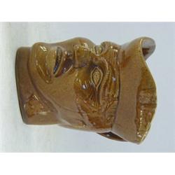 A TREACLE GLAZED CHARACTER JUG, 19th Century, gentleman, height 14cm  20-30...