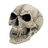 Image 1 : CRACKED SKULL FIGURINE
