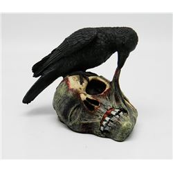 CROW EATING SKULL