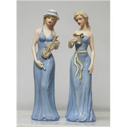 Beautiful Set of 2 Porcelain women figurines holding in