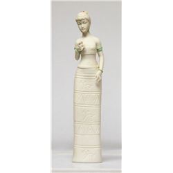 Modern Female Figurine holding flower