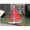 Image 1 : Hand Made 21" Red Floating Sailboat - Red Sails