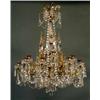 Image 1 : CHANDELIERS & LAMPS, KRISTALLKRONA FÖR 15 LJUS, ORNAMENTERAD STOMME AV FÖRGYLLD MÄSSING, OLIKFORM…