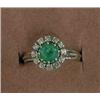 Image 1 : JEWELLERY, RING, VITGULD MED FASETTSLIPAD SMARAGD CA. 0,50 CT SAMT BRILJANTER 0,24 CT…