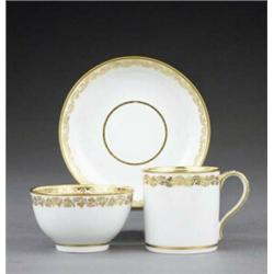 A Derby trio of tea bowl, - A Derby trio of tea bowl, coffee can and saucer, pattern 210, each g...