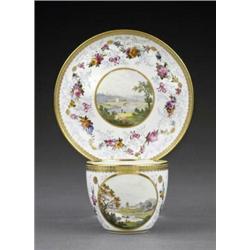 A rare Derby tea cup and saucer, - A rare Derby tea cup and saucer, pattern 320, painted, by Zac...
