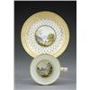 Image 1 : A Derby tea cup and saucer, - A Derby tea cup and saucer, pattern 118, painted, in the manner of...