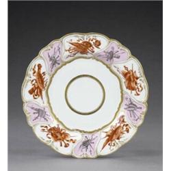 A Derby shaped circular plate, - A Derby shaped circular plate, the centre with two gilt concent...