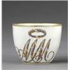 Image 1 : A Derby tea cup, - A Derby tea cup, enamelled with a large cursive monogram MM beneath a chaplet...