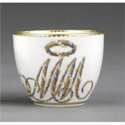 A further Derby tea cup, - A further Derby tea cup, enamelled with a large cursive monogram MM b...