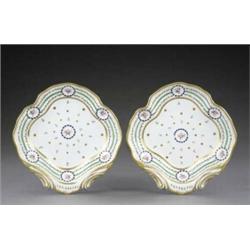 A pair of Derby shell shaped dessert dishes, - A pair of Derby shell shaped dessert dishes, the...