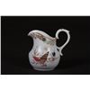 Image 1 : A SONGSHITING MARKED EXPORT PORCELAIN CREAM JUG ENAMELED WITH SEASHELLS AND HEIGHTENED WITH GILDING 
