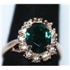Image 1 : GREEN AND CLEAR CZ GOLD PLATED BRASS RING