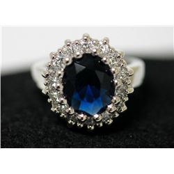 PLATINUM PLATED RING W/ CA SAPPHIRE AND CLEAR CZ