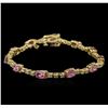 Image 1 : 4.73ctw Pink Sapphire and Diamond Bracelet - 14KT Yellow Gold