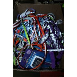 BOX WITH DOG HARNESSES, BRUSH,  & ODOR REMOVER