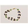 Image 2 : 14kt Yellow Gold Sapphire and Emerald Bracelet