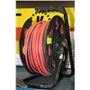 Image 1 : PORTABLE CORD REEL, 4 PLUG-INS AND