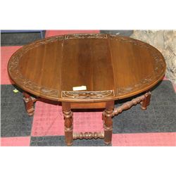 ESTATE WOOD CARVED DROP LEAF COFFEE TABLE