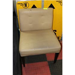 TAN & LEATHERETTE CHAIR WITH INK STAINS