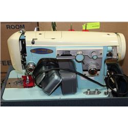 ESTATE WOODWARDS VINTAGE PORTABLE SEWING MACHINE
