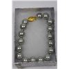 Image 1 : GRAY SEA SHELL PEARL BRACELET - 10MM