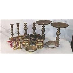 Brass candlesticks bowls in lights