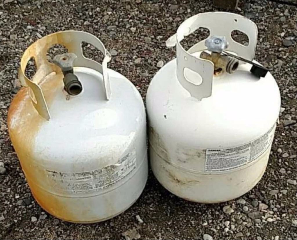 Two 20 gallon propane tanks