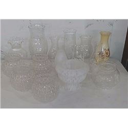 Assortment of oil lamps chimneys, light globes