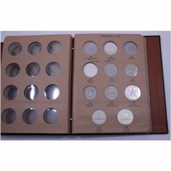 Canadian Silver Dollar collection Album with 21x Nickel and Silver Dollars. You will receive the coi