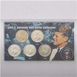 John F. Kennedy Half Dollar 5-coin set 1965-1969 in hard plastic holder with information card.