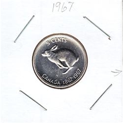 Error Struck Through Grease on 1967 Canada 5ct on the obverse side.