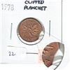 Image 1 : Error Clipped Planchet on a 1978 Canada 1-cent.