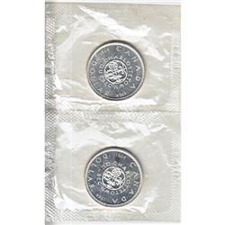 2 x 1964 Commemorative Silver Dollars still sealed in the original pliofilm plastic from the Mint. 2