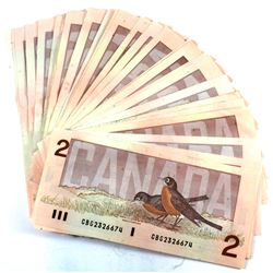 31 x 1986 $2.00 Notes in VF or Better Condition.