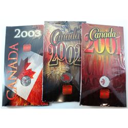 2001 Spirit, 2002 and 2003 Canada Day Coloured 25-cent Coins issued by the RCM.