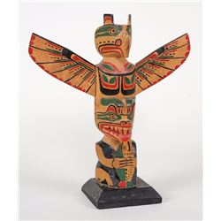 Kwakwaka'wakw Totem Carved with Thunderbird and Bear Holding a Fish Attributed To George Nelson 8 3/