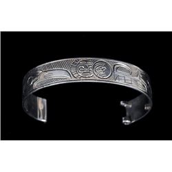 Northwest Coast Silver Woman's Watch Band with Incised Raven and Wolf Design Signed Reg 6" L. 1/2" W