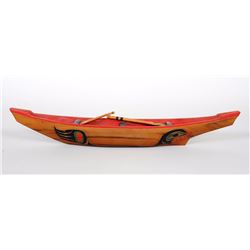 Northwest Coast Canoe with Carved and Painted Sea Lion Design and Two Paddles - Signed Illegibly 22 
