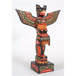 Kwakiutl Totem Carved with Thunderbird and Killer Whaler by Larry Jacobson 13 3/4" H. 10 3/4" W.  Go